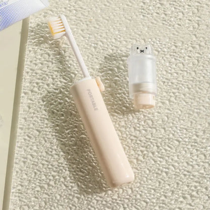 2-in-1 Foldable Travel Toothbrush with Toothpaste Dispenser